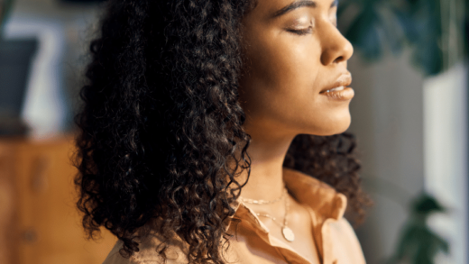 woman with her eyes closed in meditation